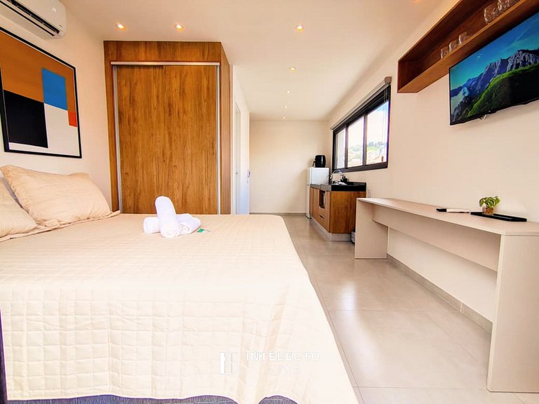 GO937-Apê 33. Studio no coração de Poços c/ar cond