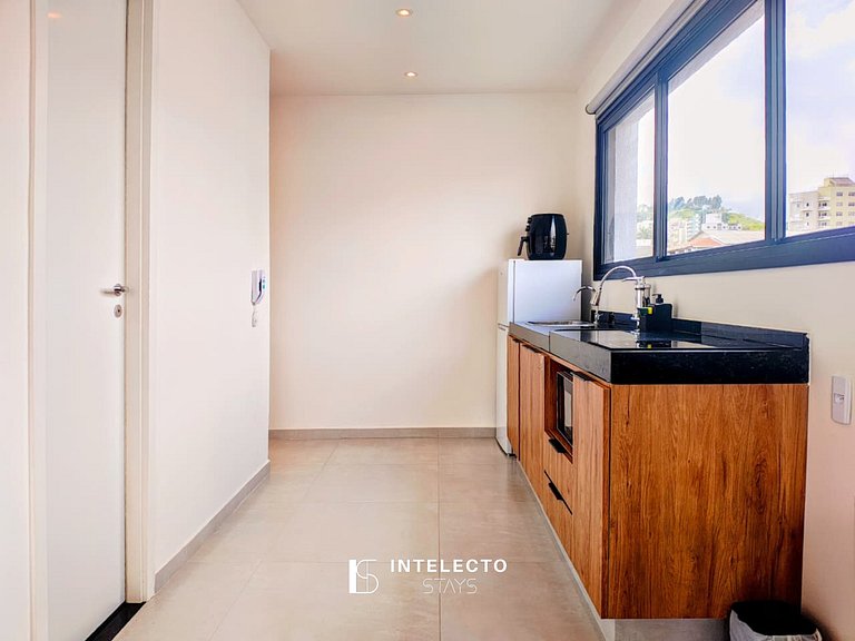 GO937-Apê 33. Studio no coração de Poços c/ar cond