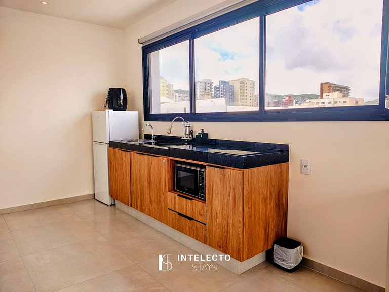 GO937-Apê 33. Studio no coração de Poços c/ar cond