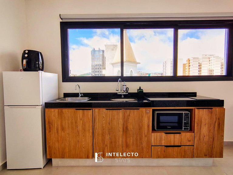 GO937-Apê 33. Studio no coração de Poços c/ar cond